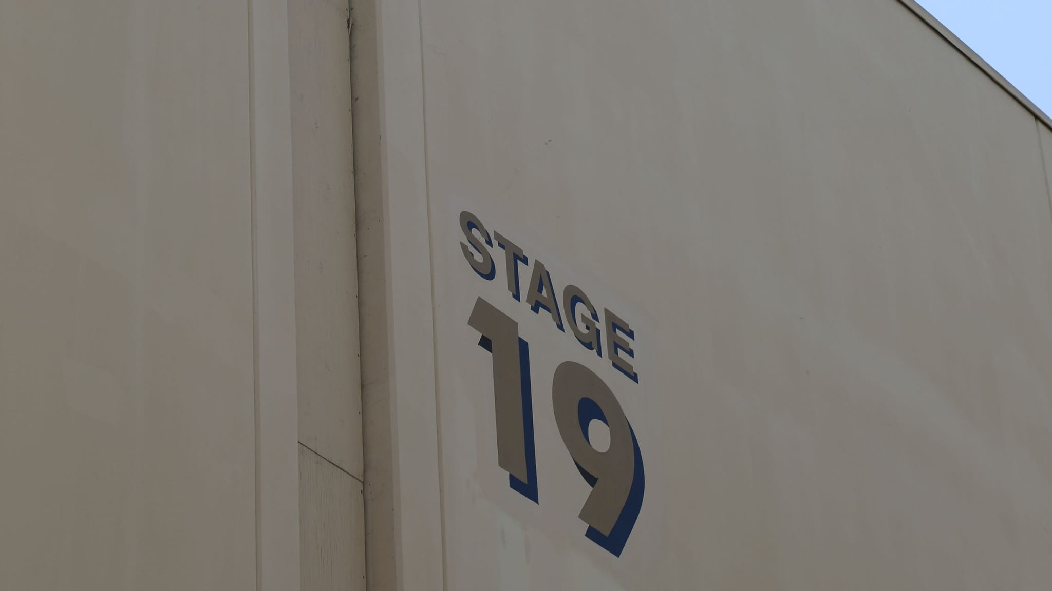 Sign on a building reads "STAGE 19".